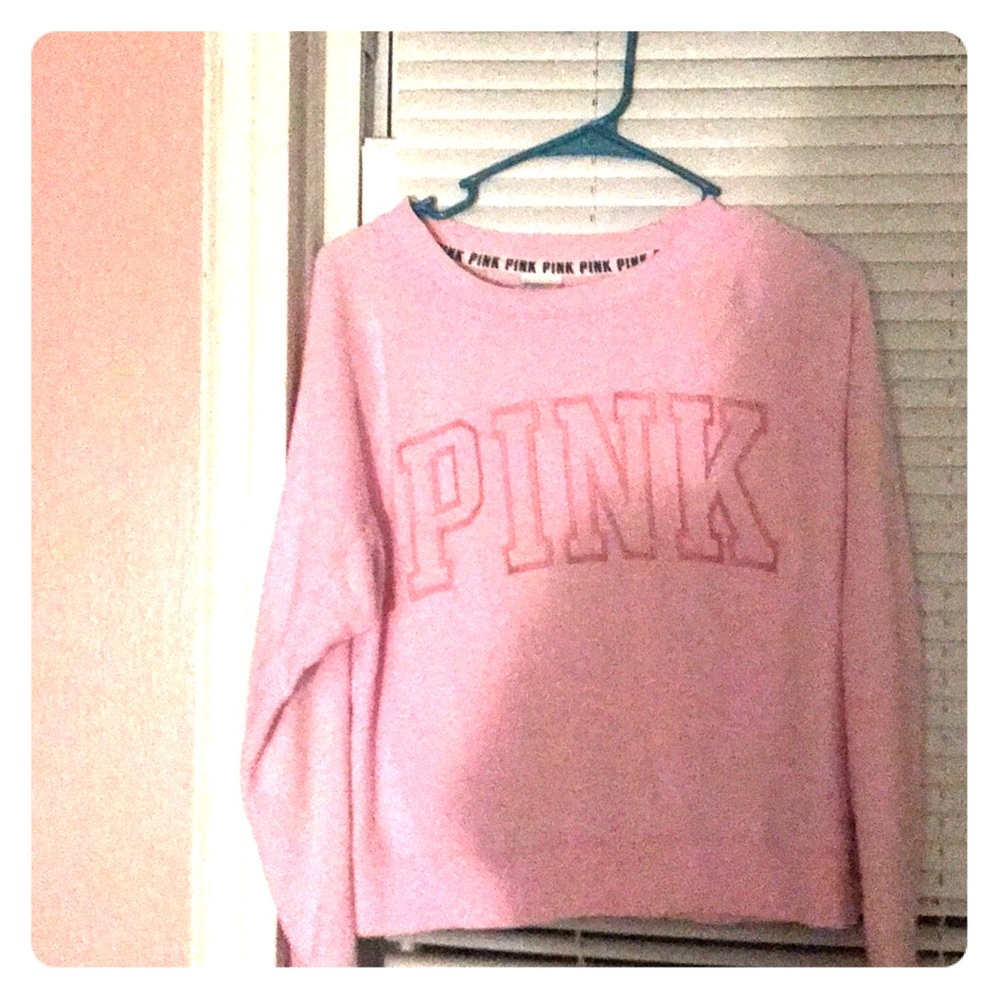 pink crew neck sweatshirt